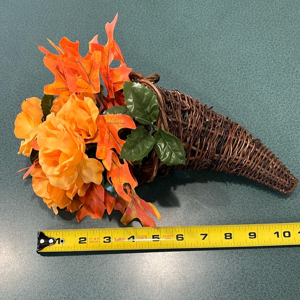 2 piece floral cornucopia. Fall/harvest decor. Orange flowers in brown.
